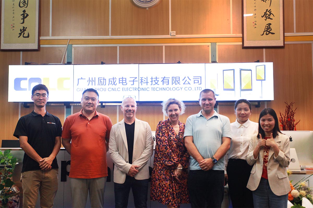 CNLC and business partners signing a new agreement for LED billboard deployment.