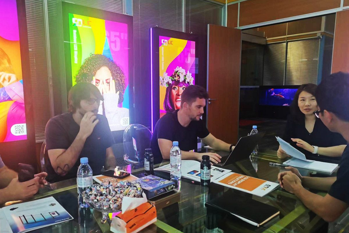 Clients analyzing the impact of LED Billboards in smart city projects.
