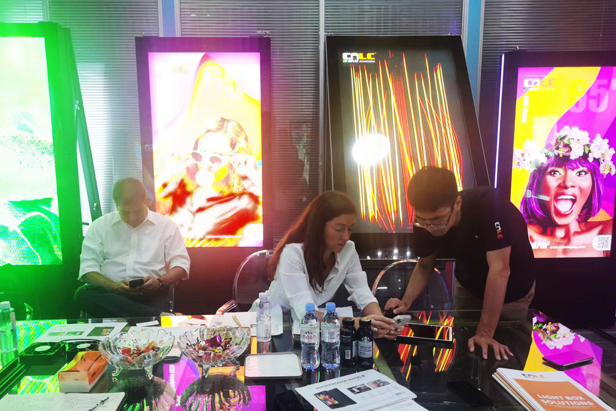 CNLC team discussing custom LED Billboard solutions with global partners.