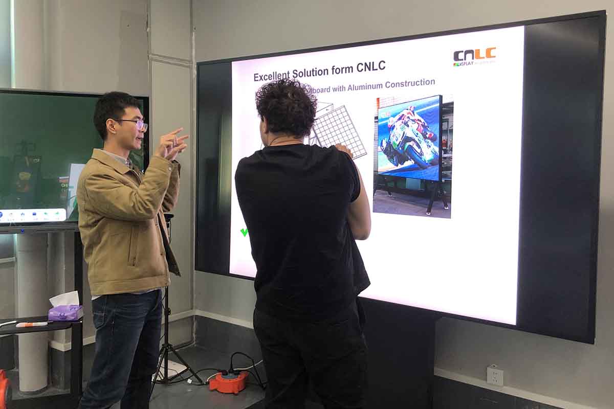 CNLC executives discussing smart LED Billboard solutions with city planners.