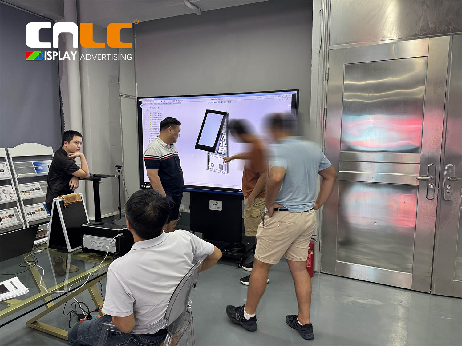 Technical exchange at CNLC for DOOH LED Mupi prototype development