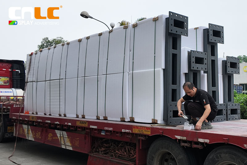 CNLC Factory Workers Preparing LED Billboards for Export