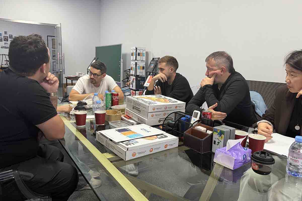 CNLC specialists consulting with clients on heat dissipation technology in LED totems.